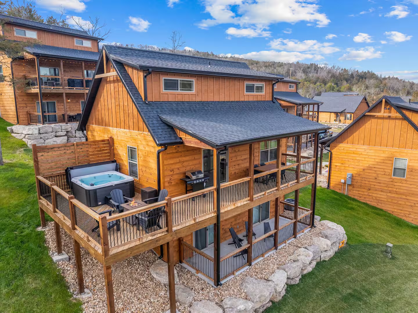 Cedar cabin with wraparound deck in a resort community